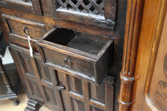 An antique Spanish walnut food cupboard, W.2ft 10in. D.1ft 7in. H.4ft 10in.